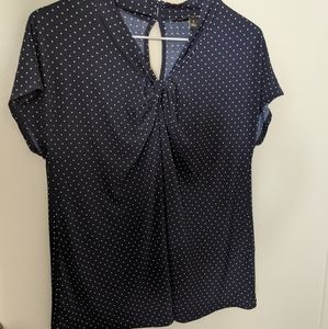 Polka dots twist front jersey top